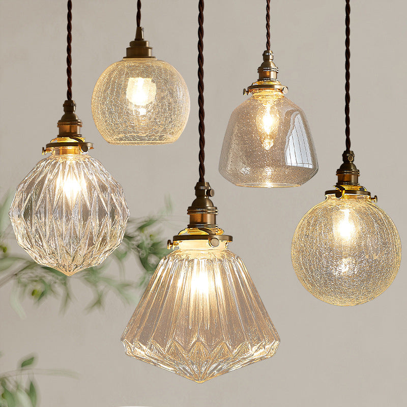 Luminaire suspendu globe en verre et cuivre vintage à une lumière