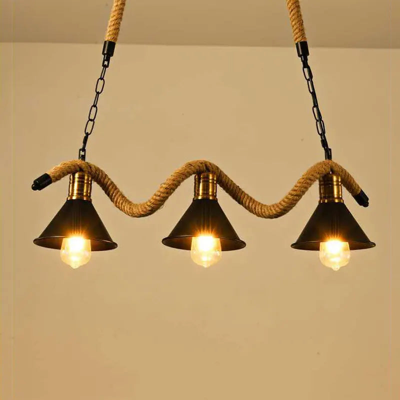 lustre industrial vintage de tres cabezas en cuerda de cáñamo