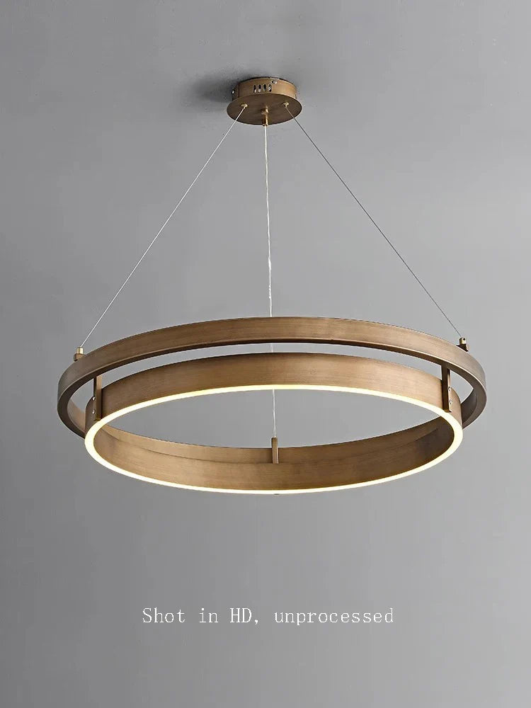 lámpara creativa 	 en bronce con suspensión led