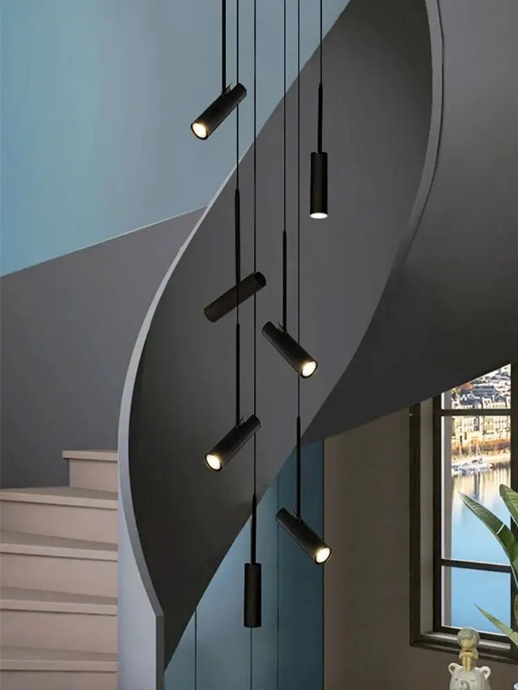 Lámpara colgante LED cilíndrica spot diseño moderno restaurante iluminación negro blanco minimalista escalera candelabro largo